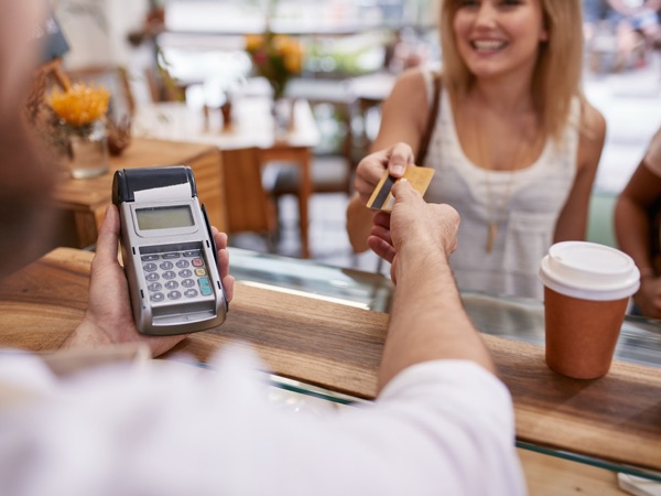 woman buying coffee